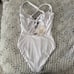 BECCA | White Ribbed Peek-a-boo Tortoise Ring One Piece Swimsuit | Large BNWT