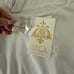 BECCA | White Ribbed Peek-a-boo Tortoise Ring One Piece Swimsuit | Large BNWT