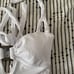 BECCA | White Ribbed Peek-a-boo Tortoise Ring One Piece Swimsuit | Large BNWT