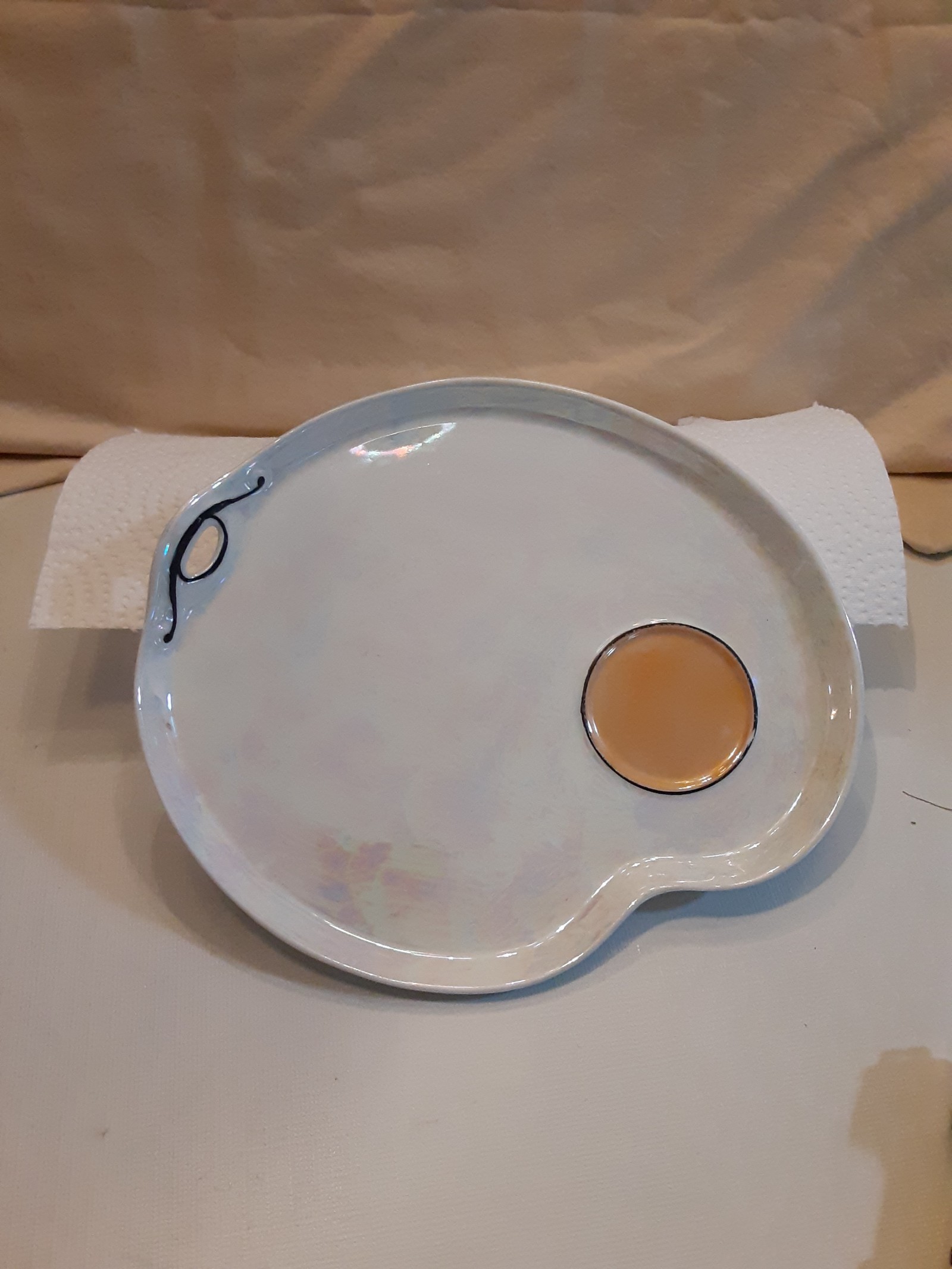 Four vintage Phoenix China lusterware trays with peach colored cup holder. Cech