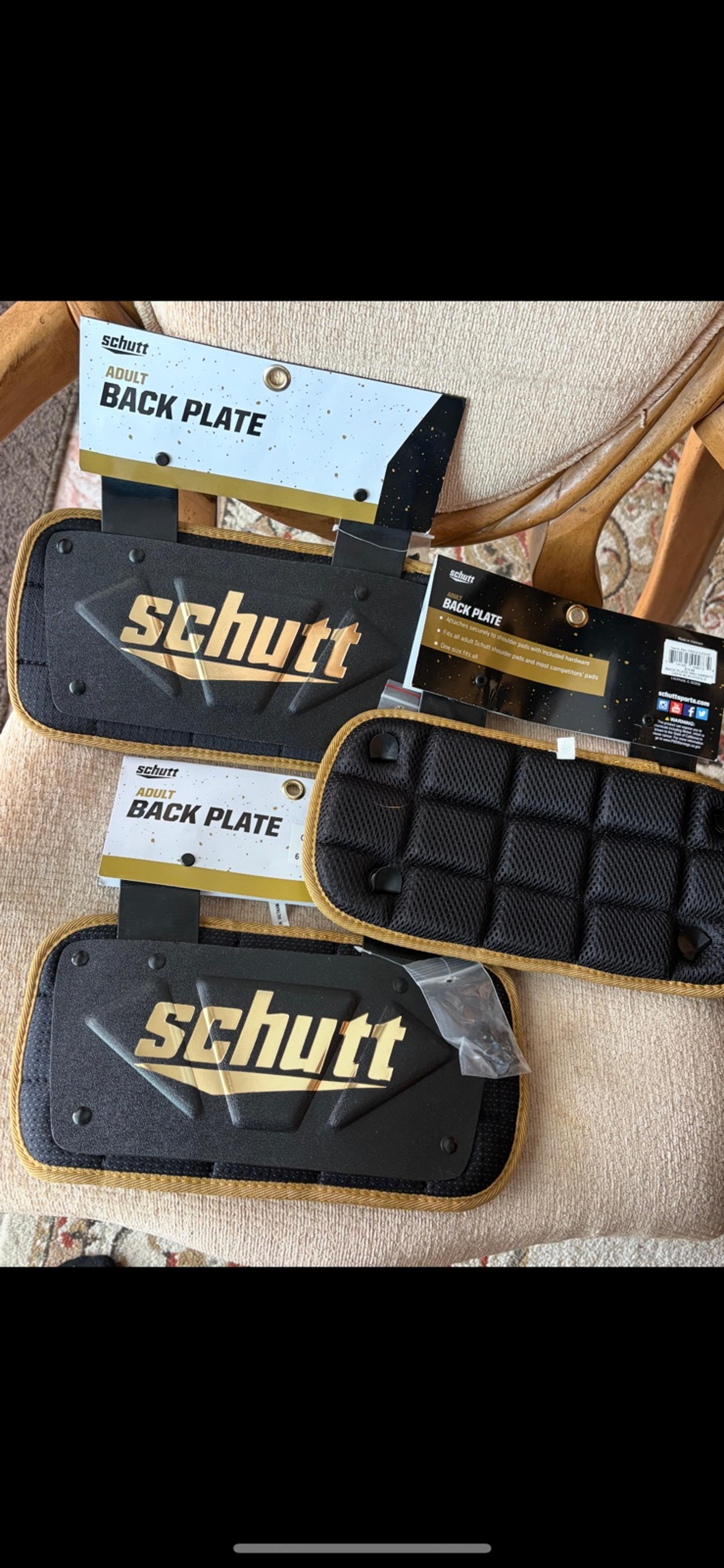 New - Schutt football back plates adult