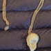 Authentic Disney Skull Necklace Gold Star eye patch Long gold chain Rare find