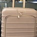 The Front Pocket Carry-On Roller in Beige