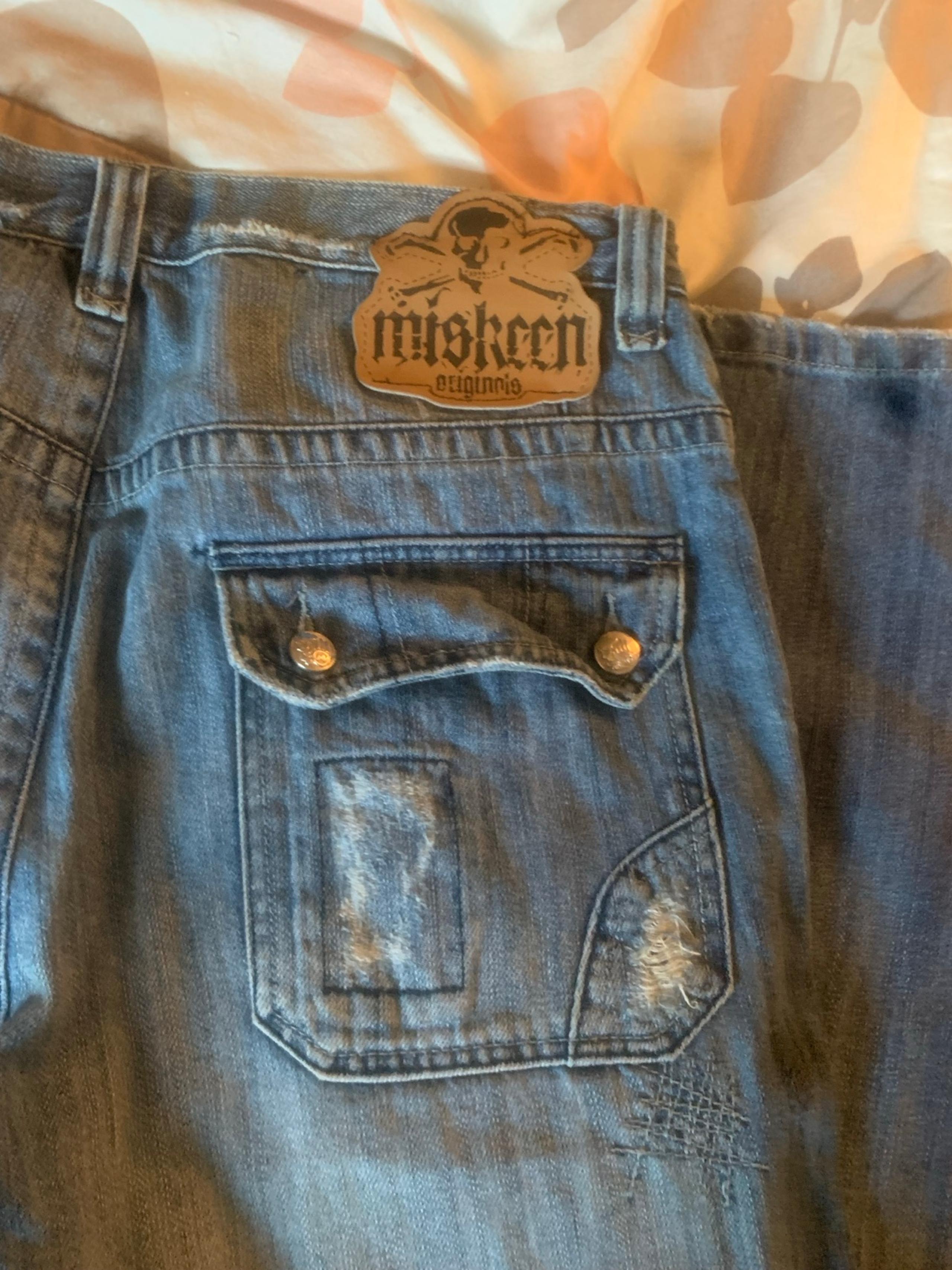 Men, distressed, baggy jeans