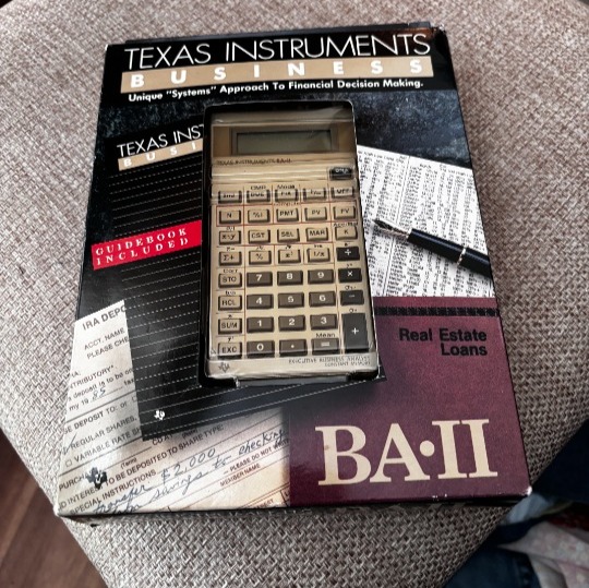 TEXAS instruments Business Calculator BA II New in package w/ guidebook