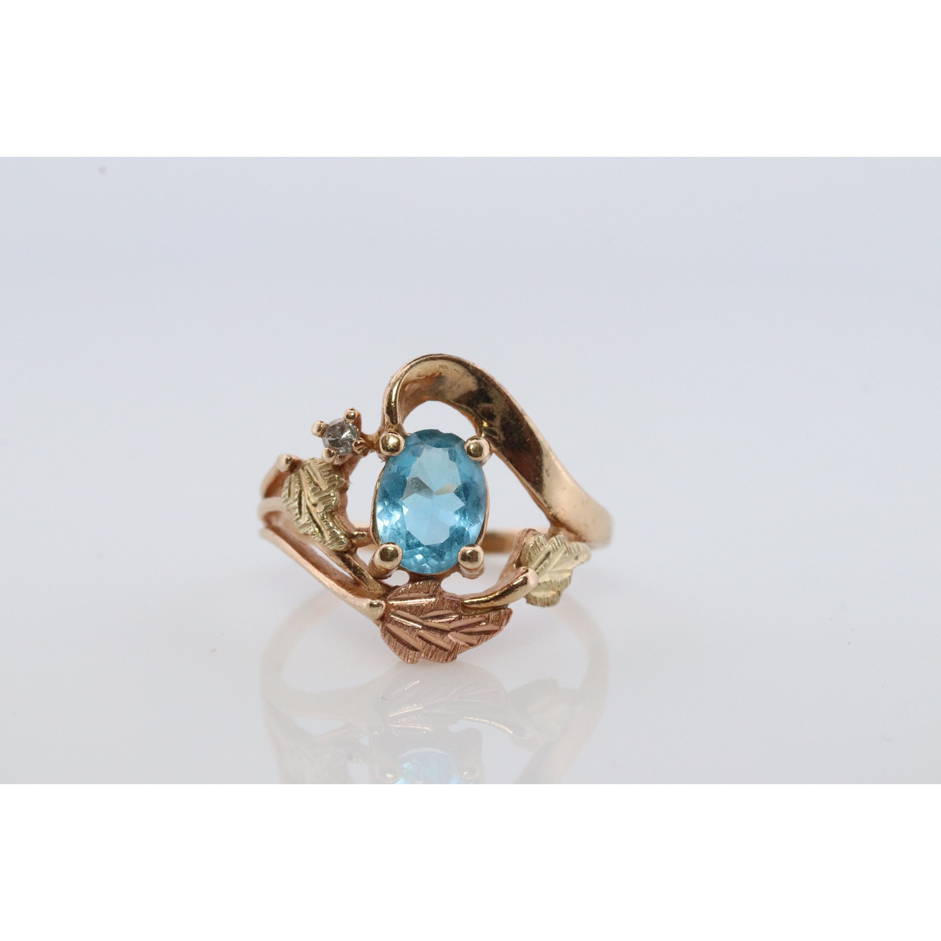 Black Hills Gold Ring. 10k Multi-Tone Blue Topaz and Diamond Black Hills Gold S