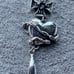 sweater long chain ( cross, heart and skull)