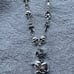 sweater long chain ( cross, heart and skull)