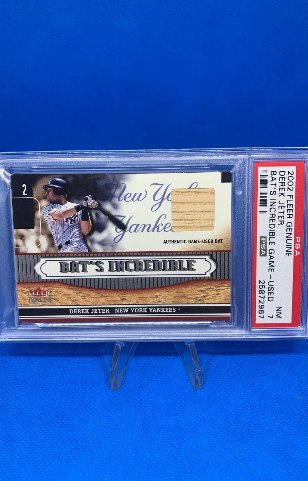 2002 fleer genuine Derek Jeter bat psa 7