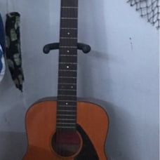 AKustic guitar with strap