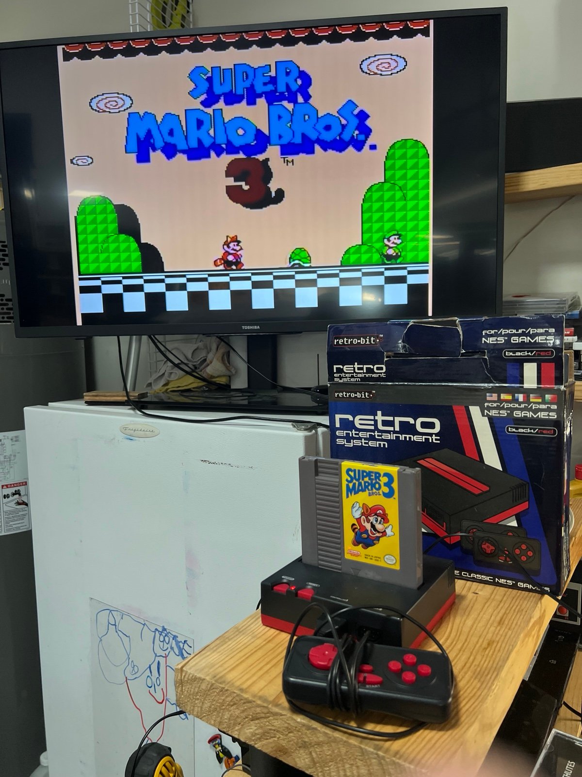 Retro-Bit NES with Super Mario 3 NES cart