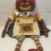 Primitive black mammy doll