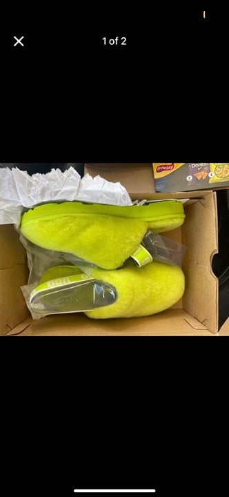 Neon green UGG slides
