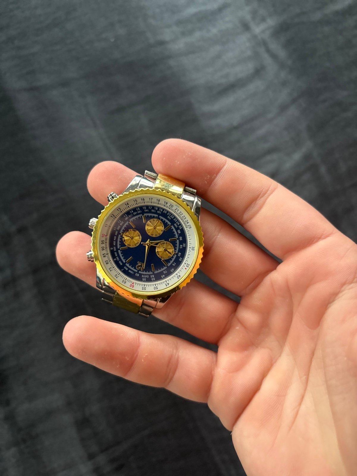 Gold compass haband watch