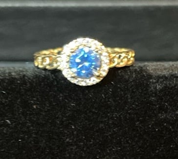 Brand new 10k Woman’s ring with CZ and Gemstone