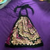 Gorgeous silk backless top. Ties at neck and waist. Entire back open.