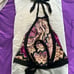 Gorgeous silk backless top. Ties at neck and waist. Entire back open.