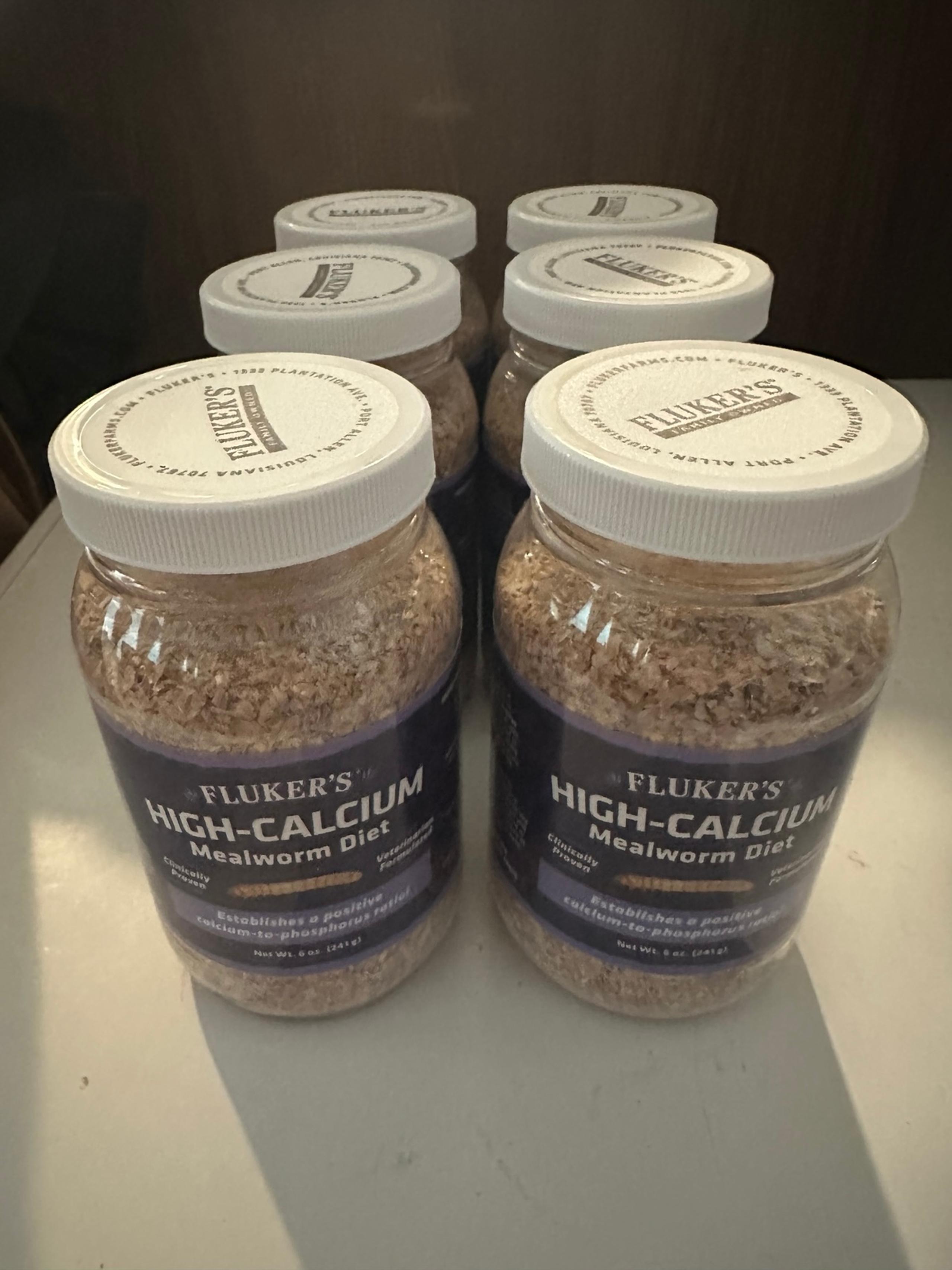 Six containers of mealworm diet
