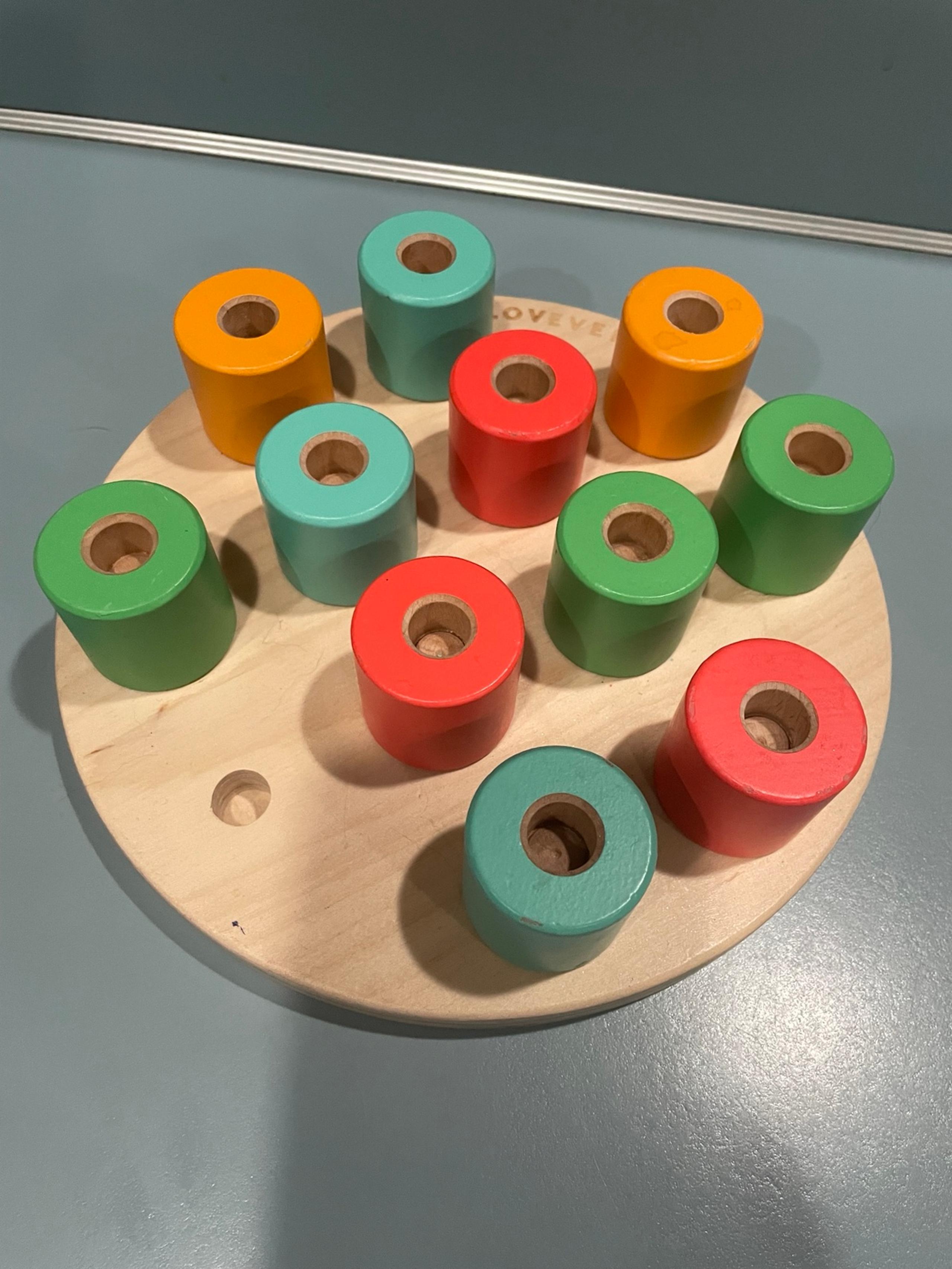 Lovevery wooden stacking peg board