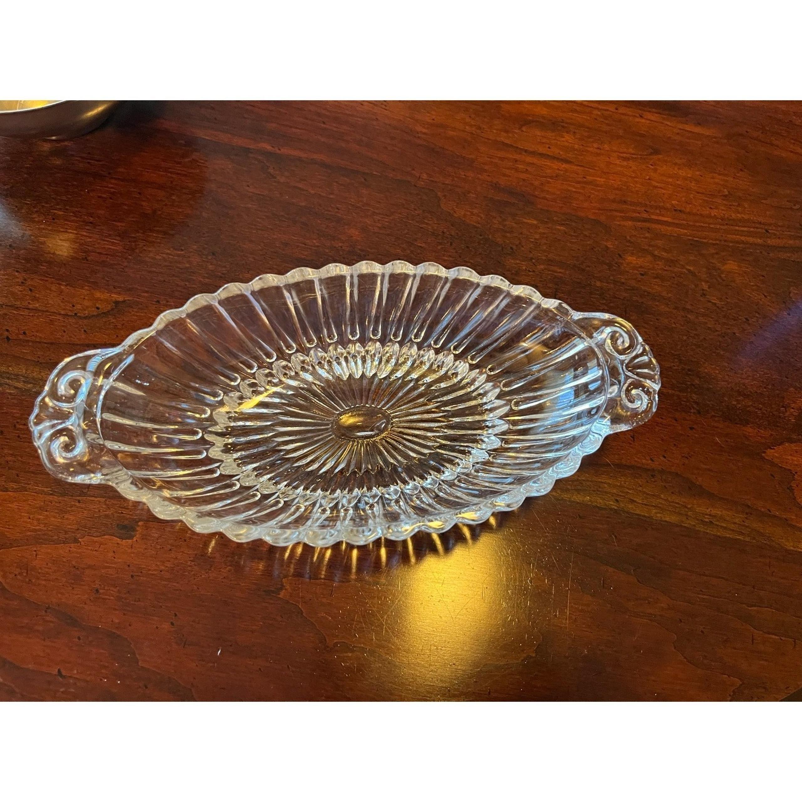 MCM glass bowl with handles 8" long cut glass scroll pattern
