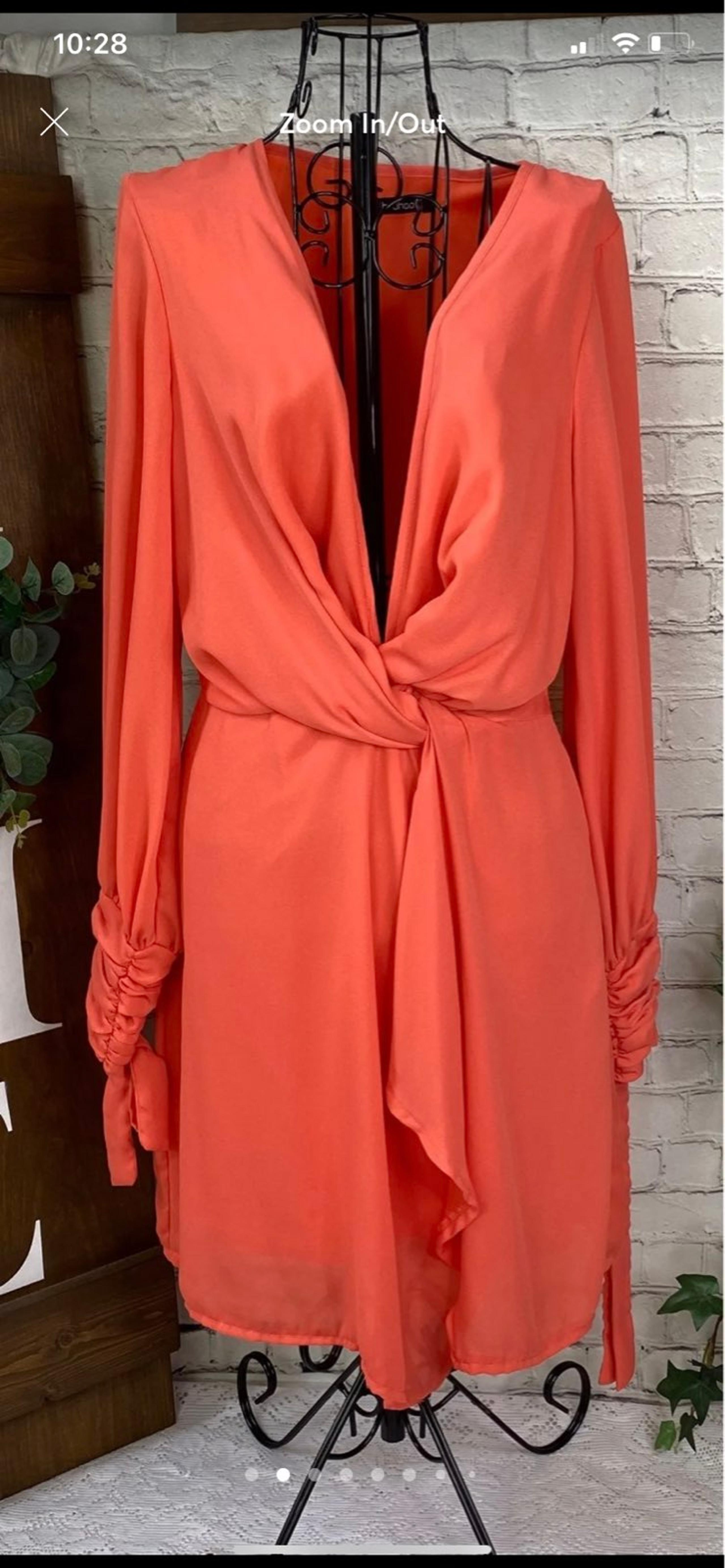 Low cut knotted dress detail from Boohoo