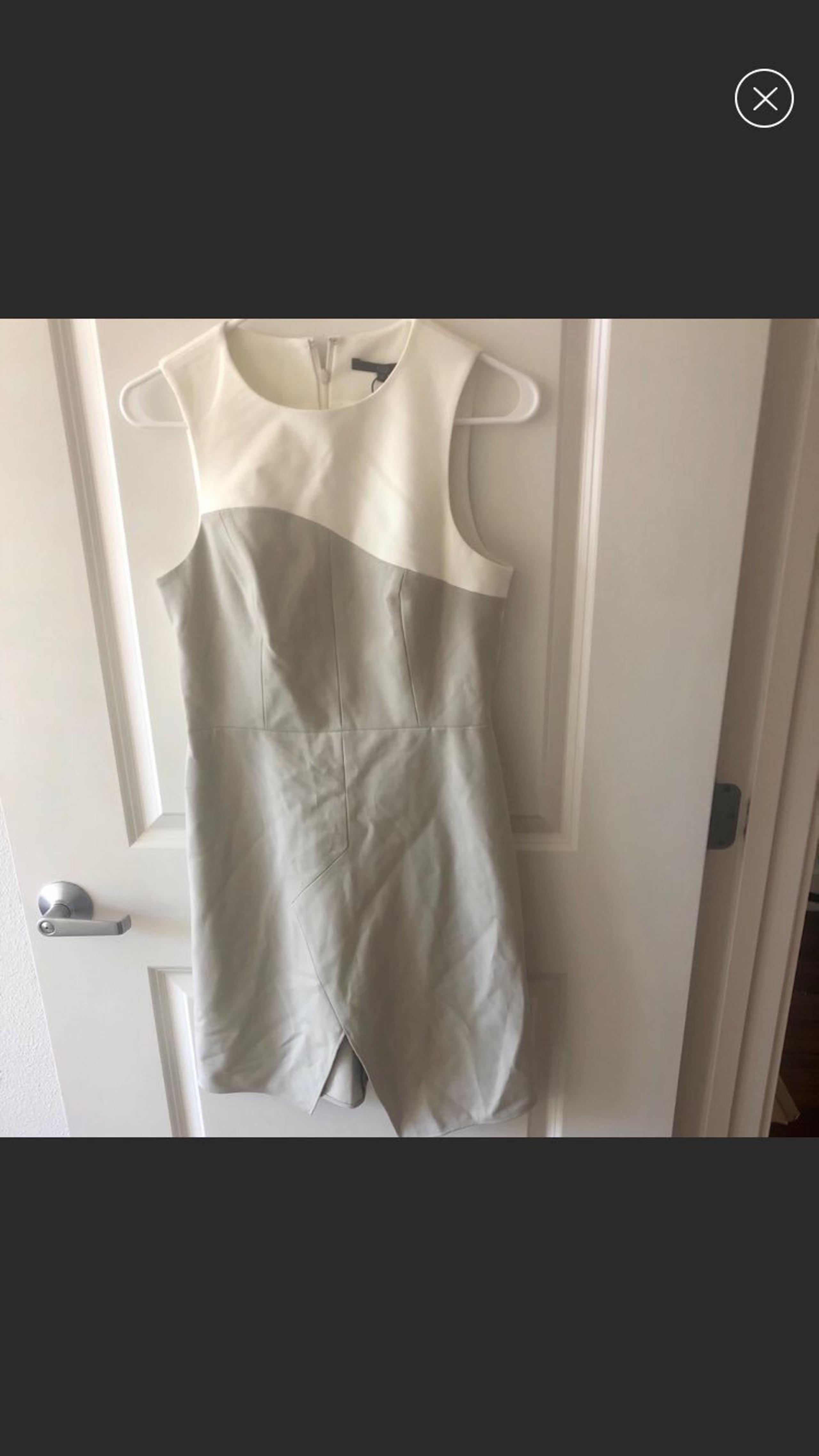 Tibi sleeveless round neck cream pencil mini dress