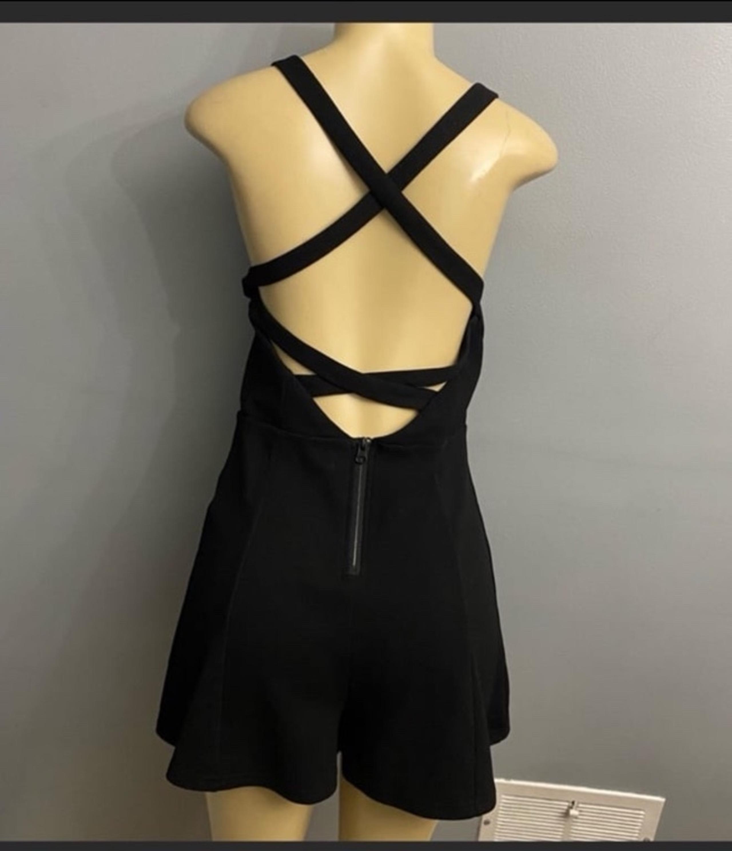 Crisscross back romper size medium