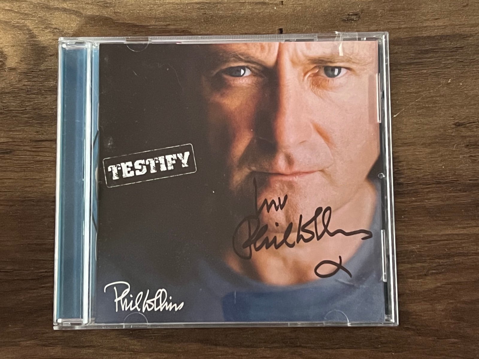 Phil Collin’s Signed Autograph CD
