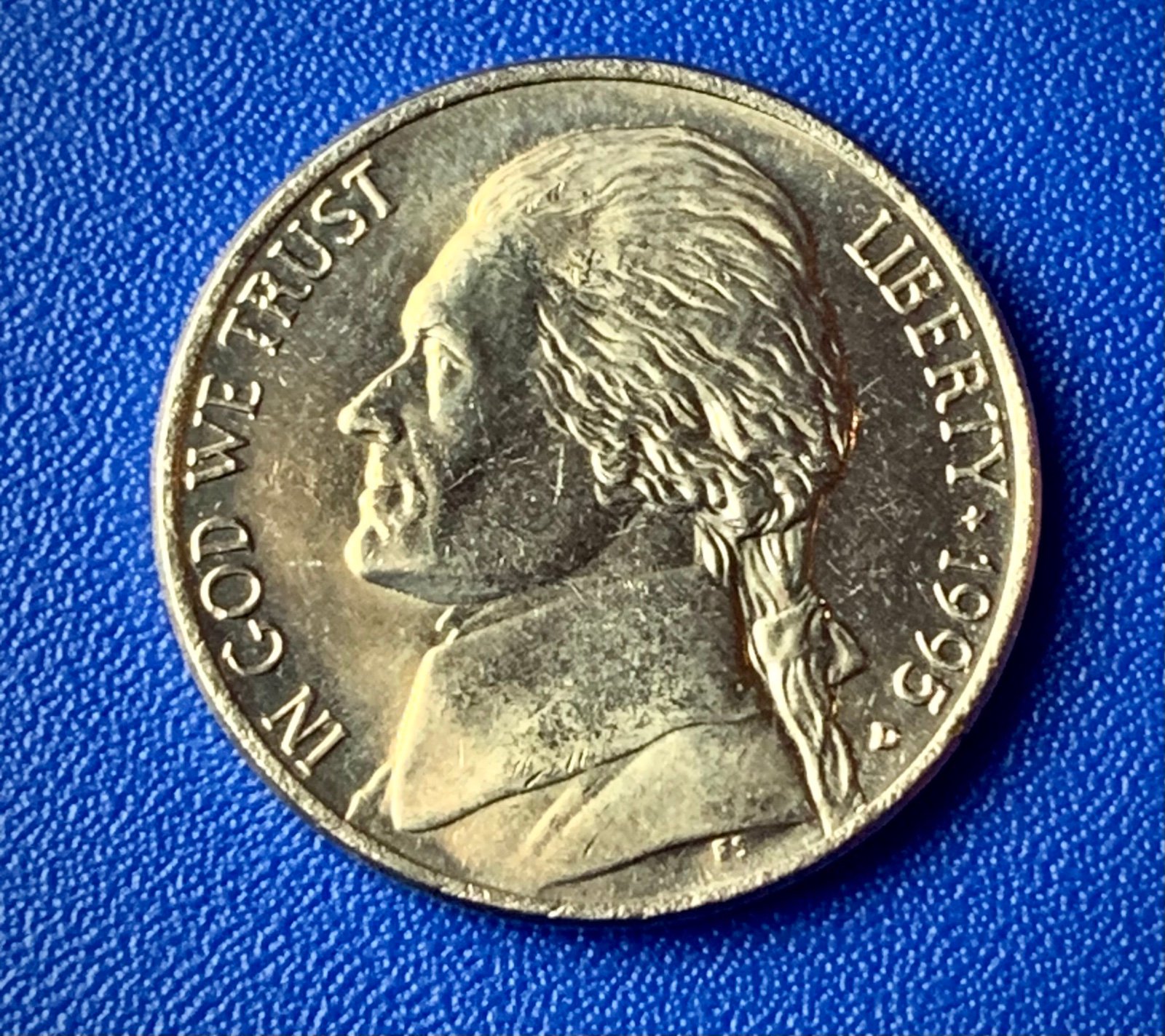 Jefferson nickel ((centered Broadstrike ))