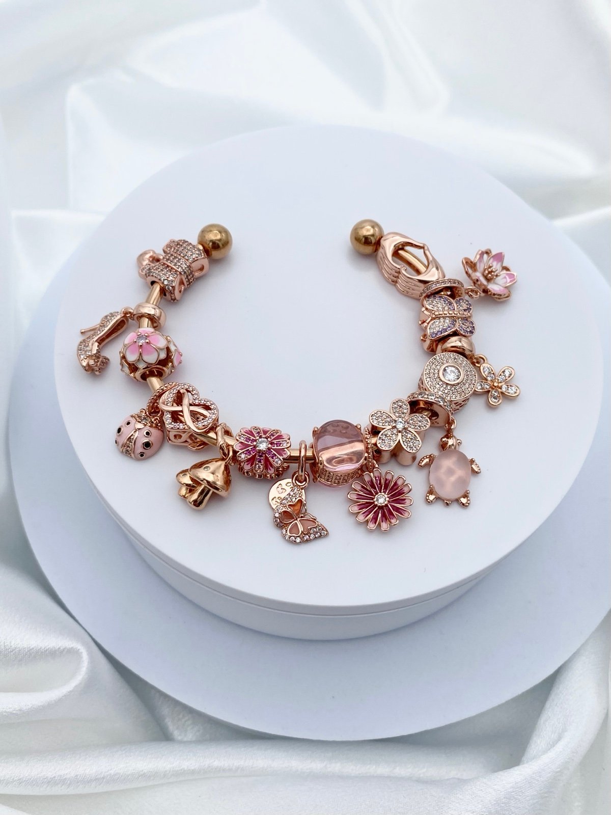 Linx Rose Gold Open Bangle with Rose Gold and Pink Zircon Themed Charms