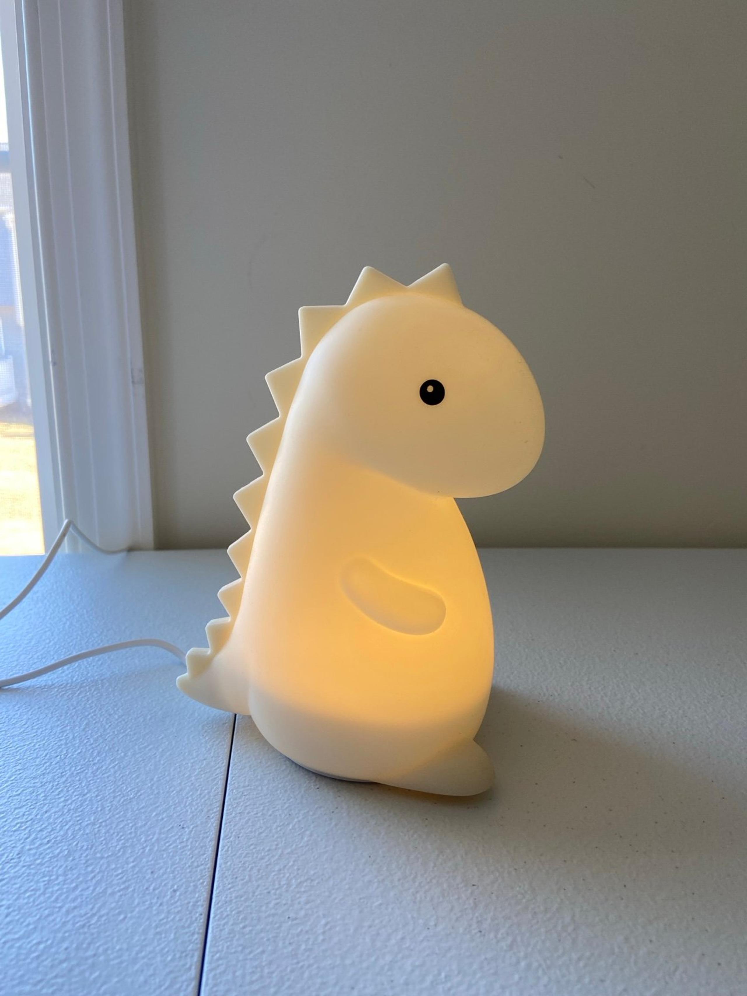 EUC Dinosaur shaped multicolored color changing light up rubber plug-in lamp