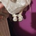 Vintage porcelain doll swinging