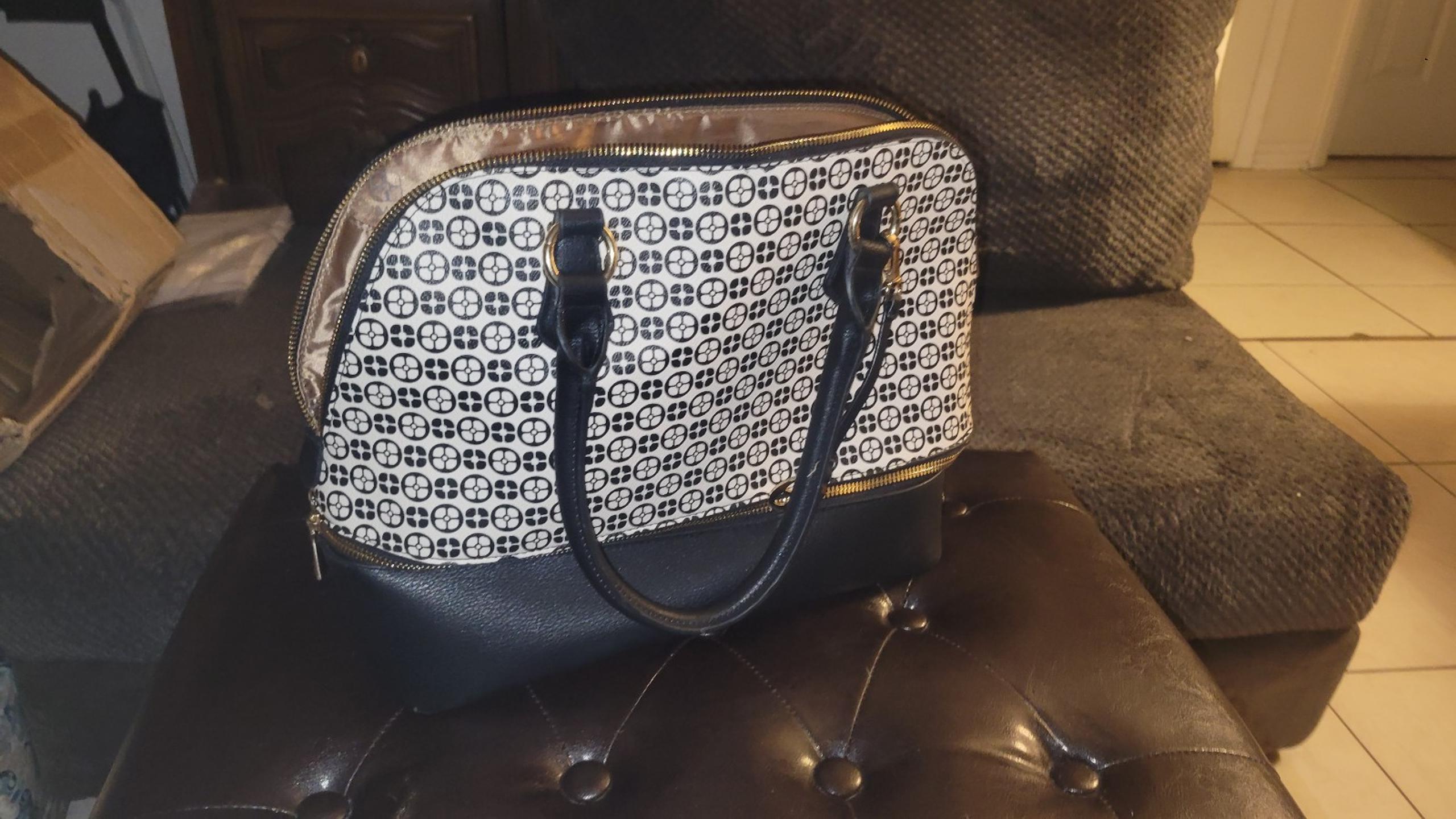 Iman black and tan tote style purse