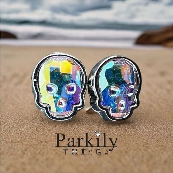 Skull post earrings made with aurora borealis Swarovski crystal in petite size