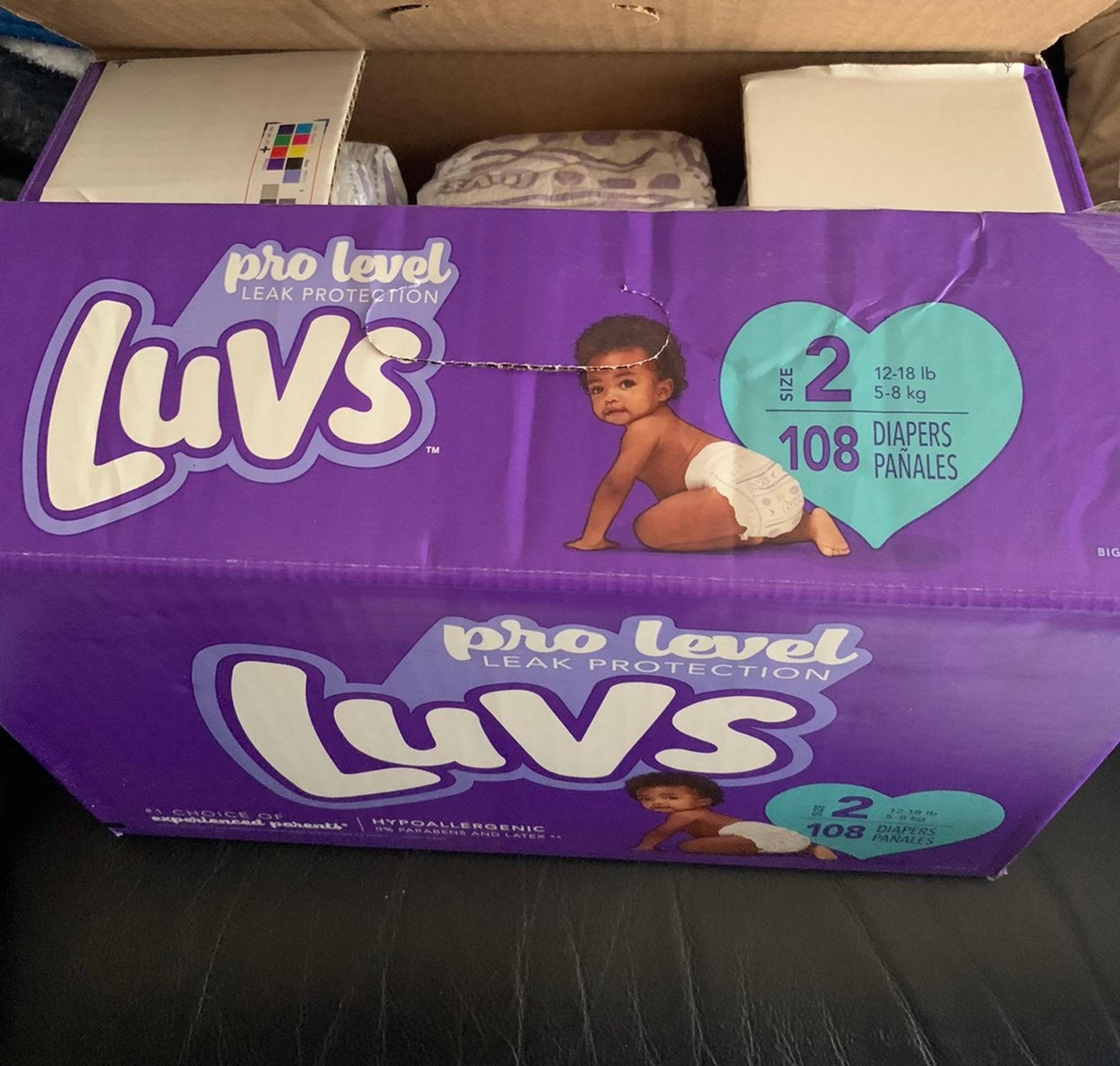 68 luvs disposable baby diapers open box size 2