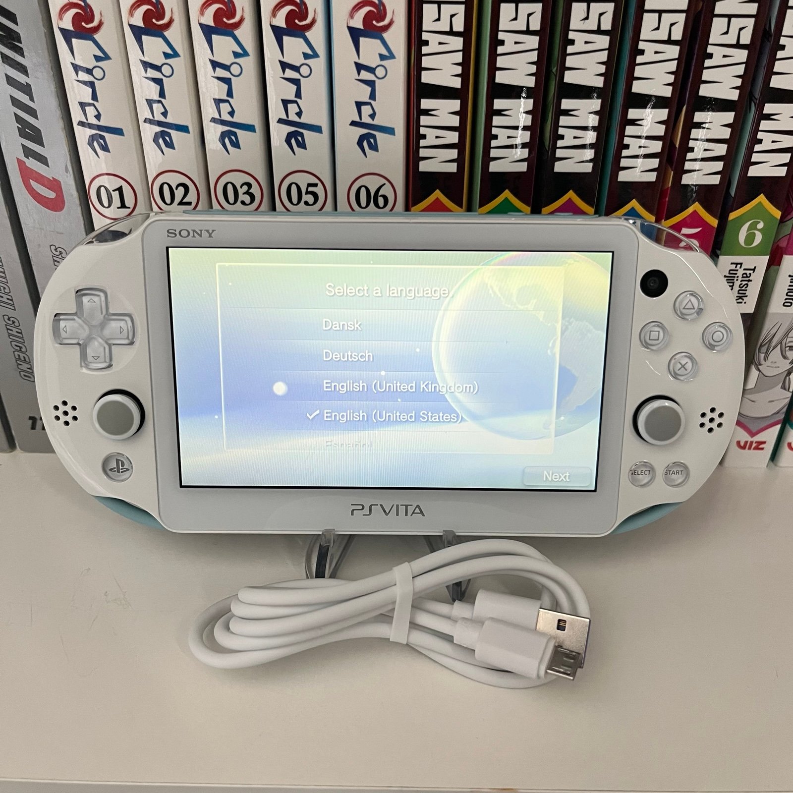 PS VITA 2000 - LIGHT BLUE - W/CHARGER - FULLY WORKING