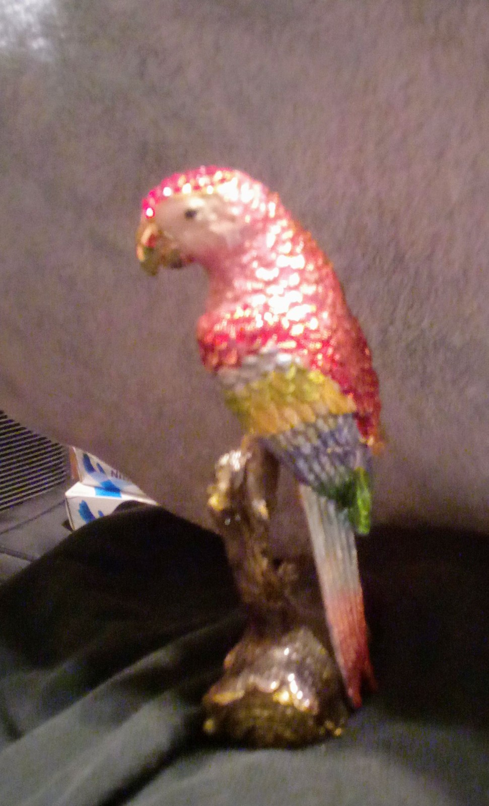 Red sworski stone Parrot trinket.