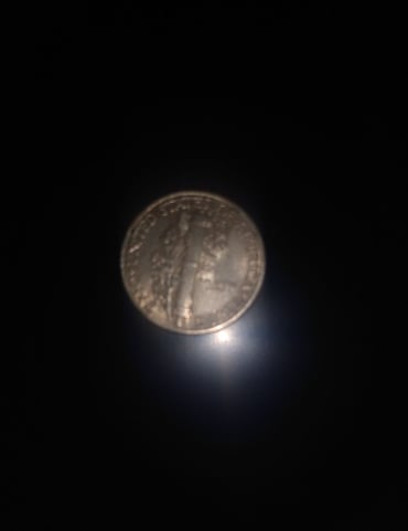 Almost uncirculated dime