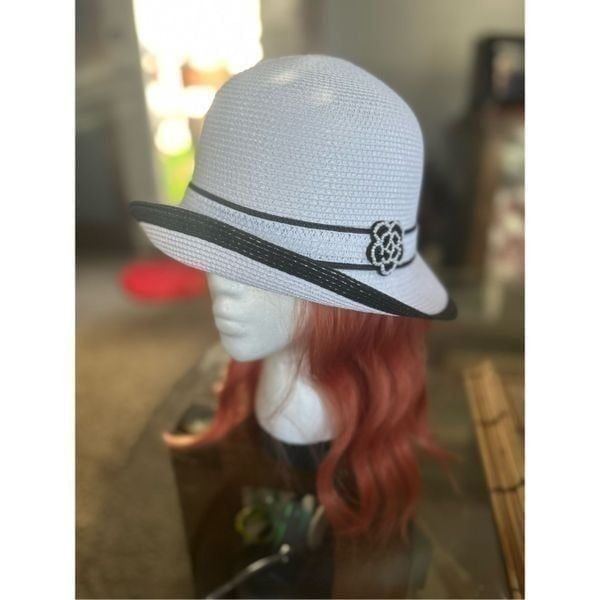 Beautiful stub bowler hat with patterned flower adjustable strap