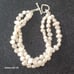 Vtg.sterling Silver Genuine pearls - three strands bracelet- 8.05 in.