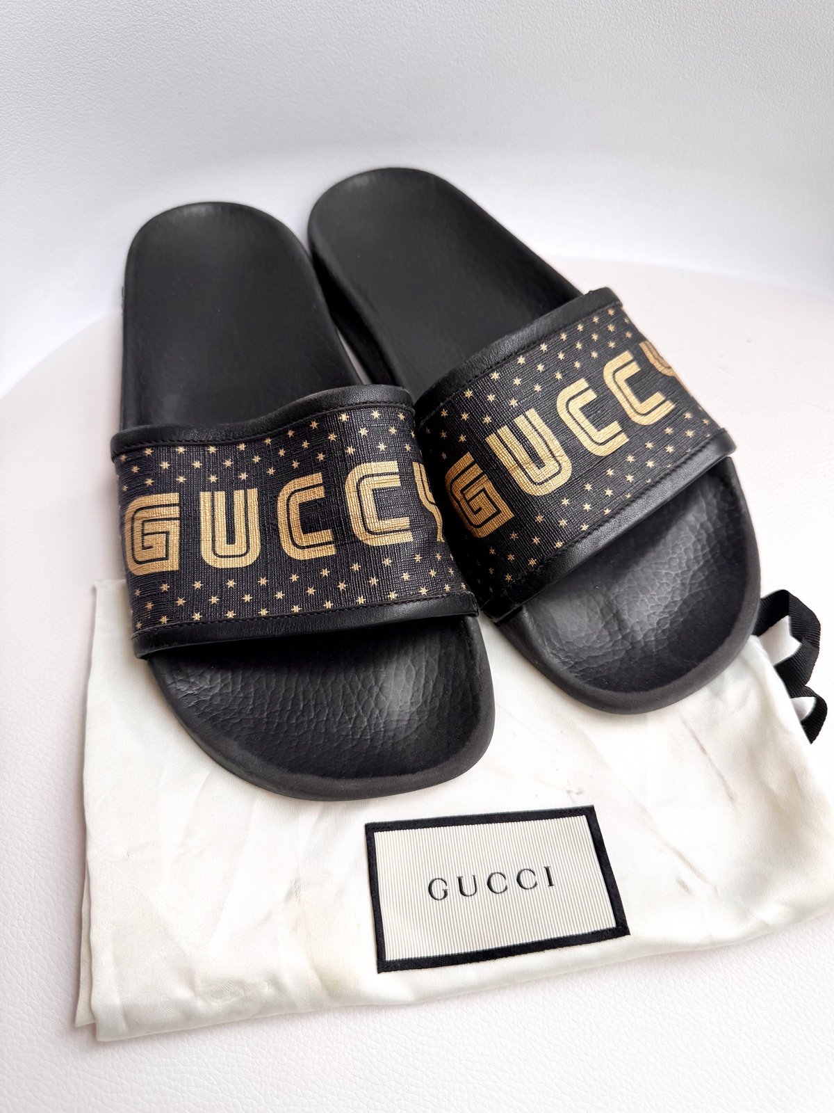 GUCCI ‘GUCCY’ gold black logo rubber leather pool slides sandals