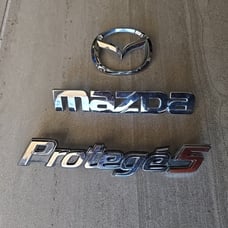 2002-2003 Genuine Mazda Protege5 Rear Trunk Nameplate & Badge Emblem Set