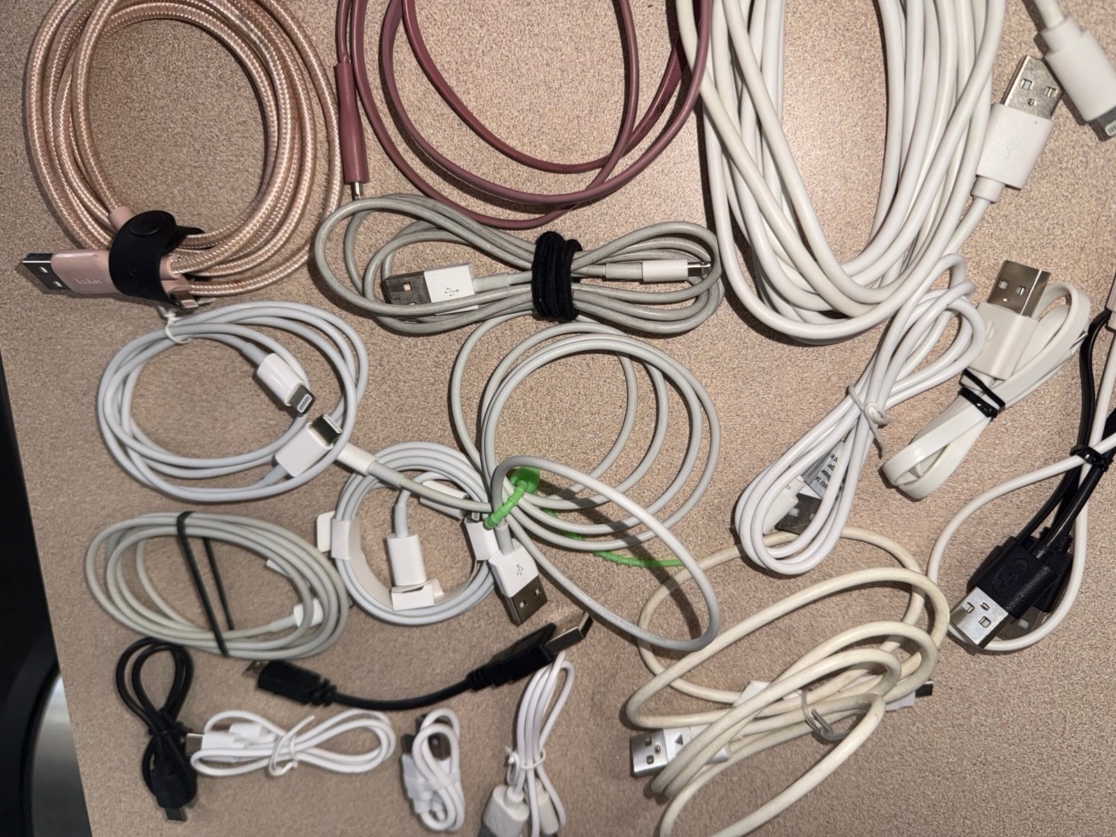 19 iPhone and assorted charging cords