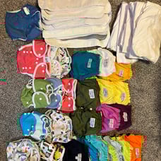 Cloth diaper lot 0-9months 21 covers 7 extra with worn elastic, inserts& cloths