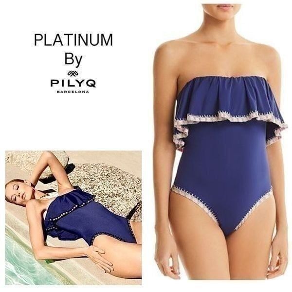 New. Platinum by PilyQ navy swimsuit. Retails 164
