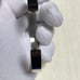 A Bulgari ring and a silver bangle.