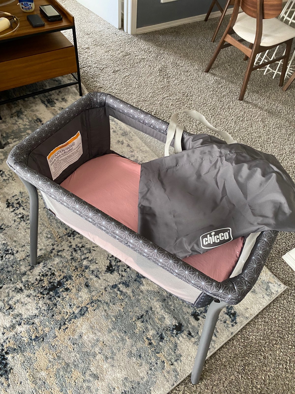 Chicco bed side bassinet for infant with breathable mesh side , pocket for items