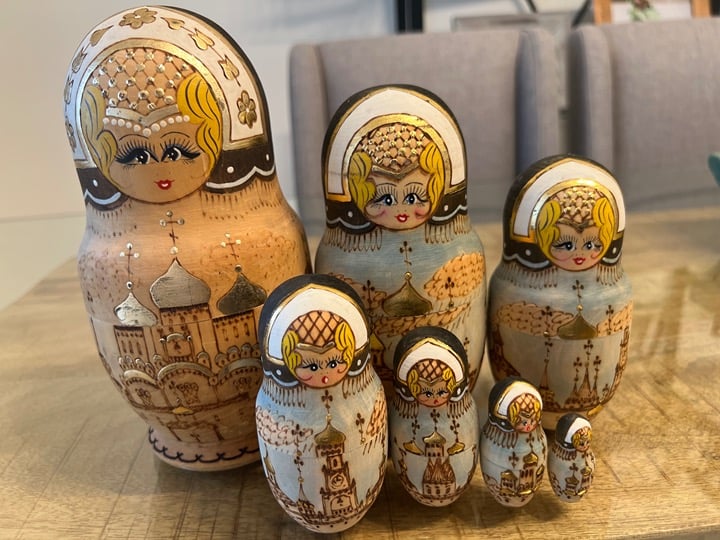 Russian Matryoshka 7 Piece Set gold trimmed Russian buildings