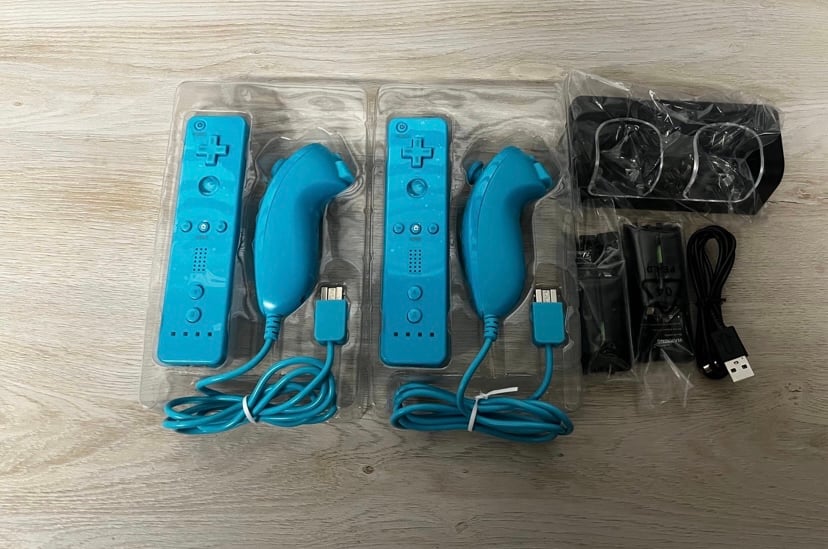 Wii 2 set of Wii remote and nunchucks with 2 rechargeable batteries brand new