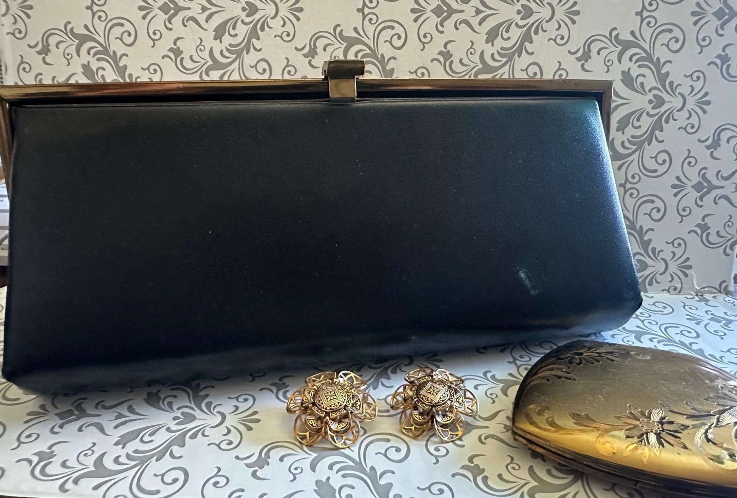 Vintage clutch, compact & clip on earring’s